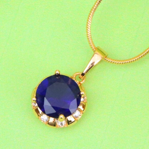 "Royal Blue Round Pendant with Sparkling Accents in Gold Finish, XPPT1647 - Picture 1 of 13